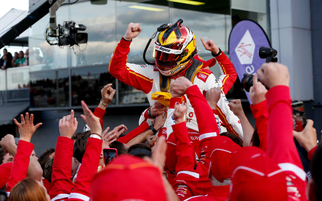Scott McLaughlin celebrates Bathurst win with his Ford team 2019.