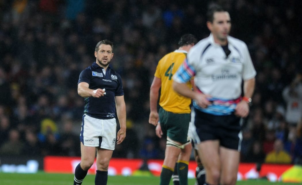 Craig Joubert runs from the field RWC2015