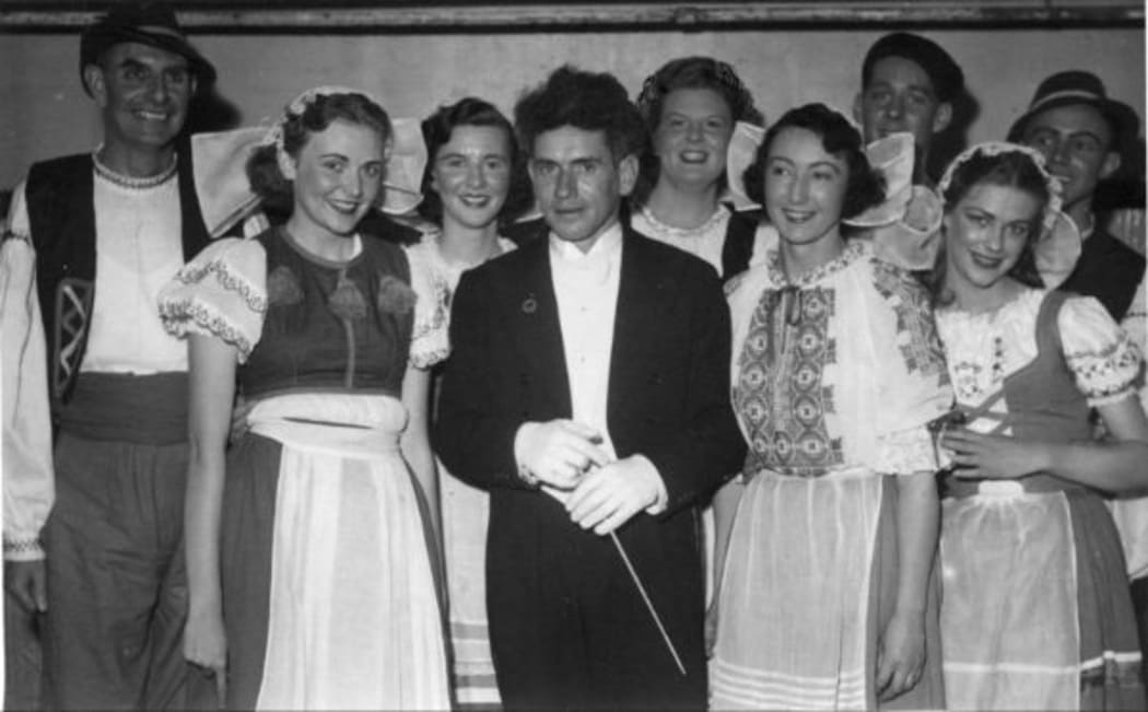 Georg Tintner with cast members of "The Bartered Bride", Auckland 1952. The woman behind Tintner’s left shoulder is the New Zealand mezzo, Heather Begg.