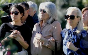 Carole Whorrall (centre) attends a service in memory of murdered son Kyle at St John's Reserve, Meadowbank.