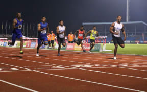 Samoa 7s debutant Kelvin Masoe (2L) won bronze in the men's 100m at the 2019 Pacific Games.