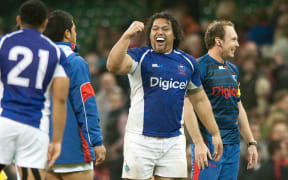 Census Johnston celebrates victory over Wales in 2012.