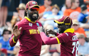 Chris Gayle (left)