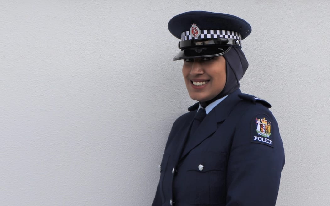 Constable Zeena Ali wearing her uniform hijab.