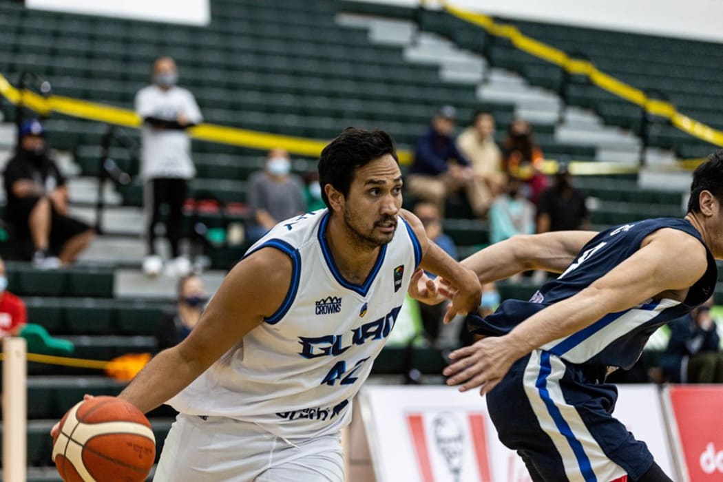 Guam men's basketball captain Tai Wesley in action against Chinese Taipei.