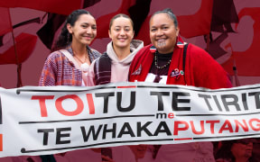 Composite of Chelsea Reti, and Jo Murray, protest banner and Tino Rangatiratanga flags