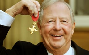 Tim Brooke-Taylor, proudly holds his OBE after it was presented to him by Prince Charles, Prince Of Wales during an investiture ceremony at Buckingham Palace on November 17, 2011 in London.