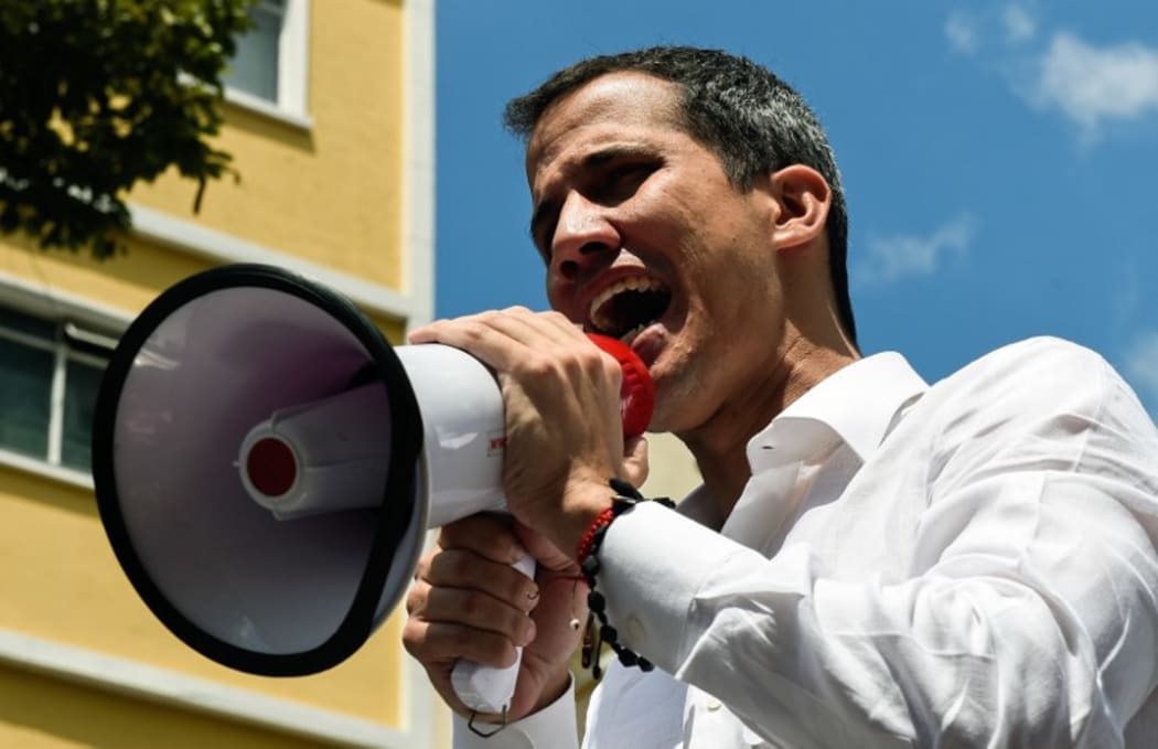 Venezuelan opposition leader and self-proclaimed acting president Juan Guaido speaks during a demo in Caracas on March 9, 2019.