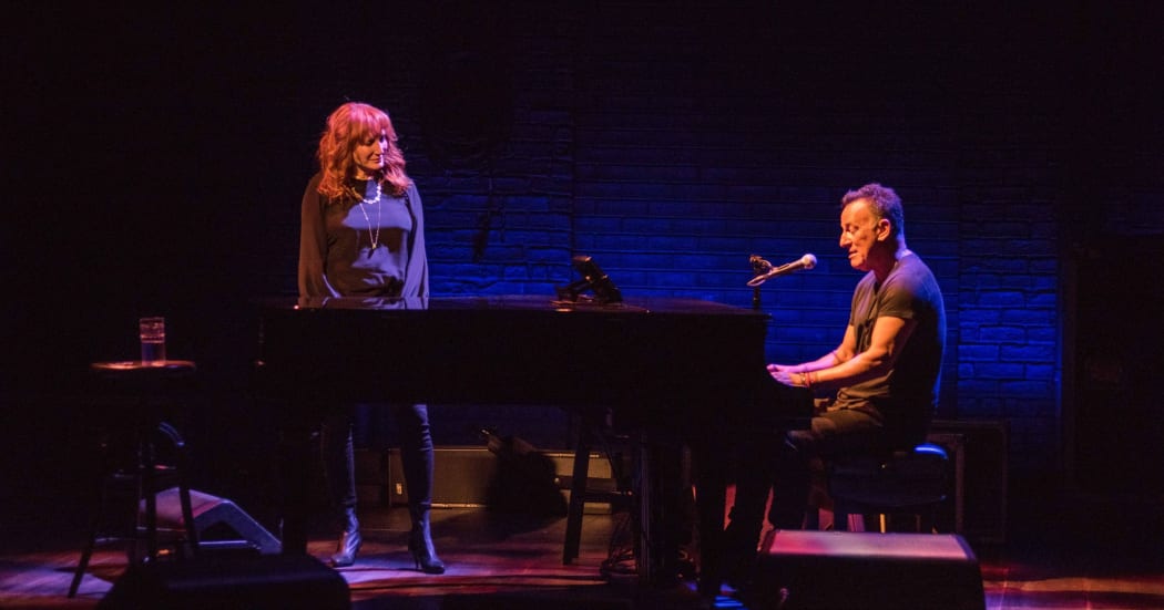 Patti Scialfa and Bruce Springsteen on stage in the Netflix special, Springsteen on Broadway.