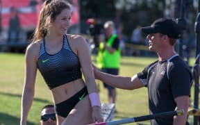 Eliza McCartney is encouraged by coach Jeremy McColl in 2017.