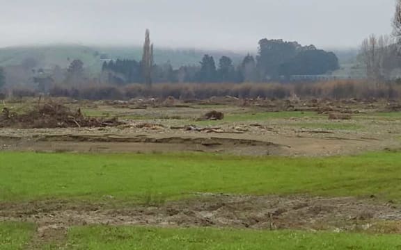 Grazing paddocks are strewn with slash and debris at Dion McGaveston's Tapawera farm, when the Motueka River burst its banks during the recent floods.
