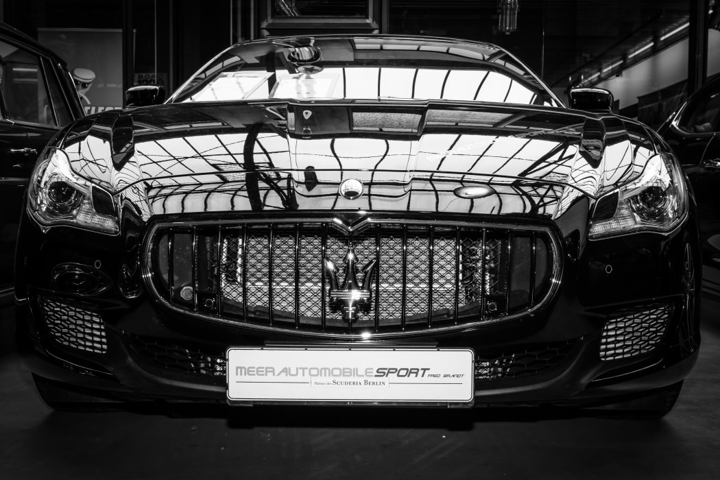 BERLIN, GERMANY - MAY 17, 2014: Executive car Maserati Ghibli (M157). Black and white. 27th Oldtimer Day Berlin - Brandenburg