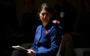 Australia's New South Wales Premier Gladys Berejiklian attends the Remembrance Day Service to mark the anniversary of the end of World War I, at Martin Place in Sydney on November 11, 2020. (Photo by Saeed KHAN / POOL / AFP)