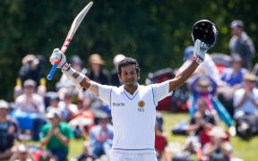 Sri Lankan batsman Dimuth Karunaratne celebrates his maiden test century vs New Zealand 2014.