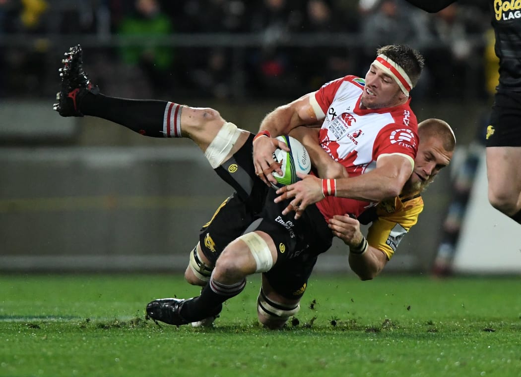 The Hurricanes' Brad Shields tackles the Lions Jaco Kriel in the Super Rugby Final, Hurricanes v Lions, Westpac Stadium, Wellington, Saturday, August 06, 2016.