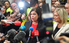 Sinn Féin party leader Mary Lou McDonald speaks to members of the media beside the party's Deputy First Minister of Northern Ireland, Michelle O'Neill.