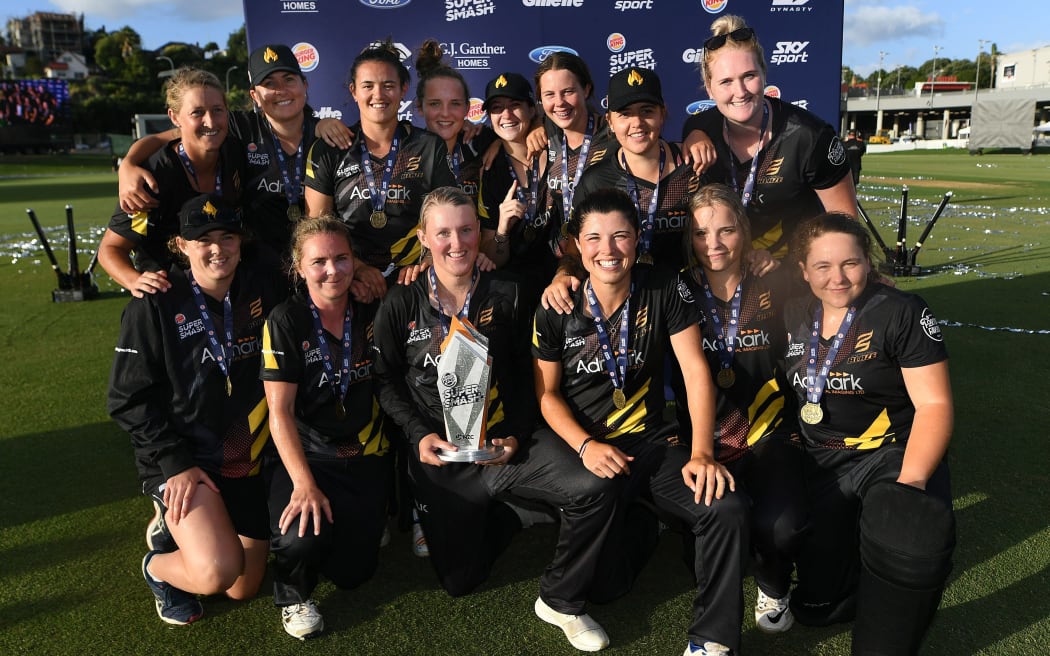 Wellington Blaze players winning team photo.