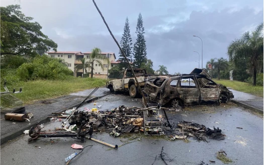 Burnt out cars in New Caledonia during civil unrest.