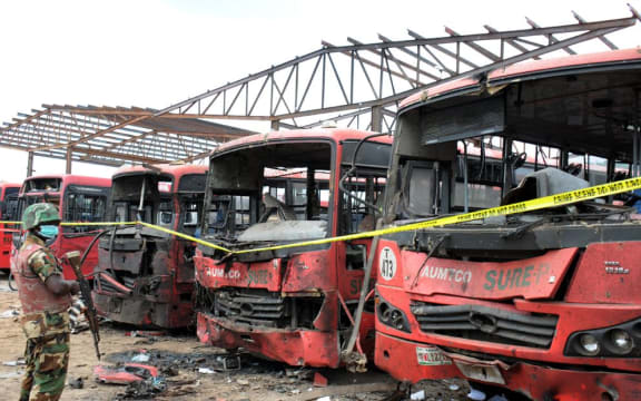The scene after the bombing of a bus depot in the capital.