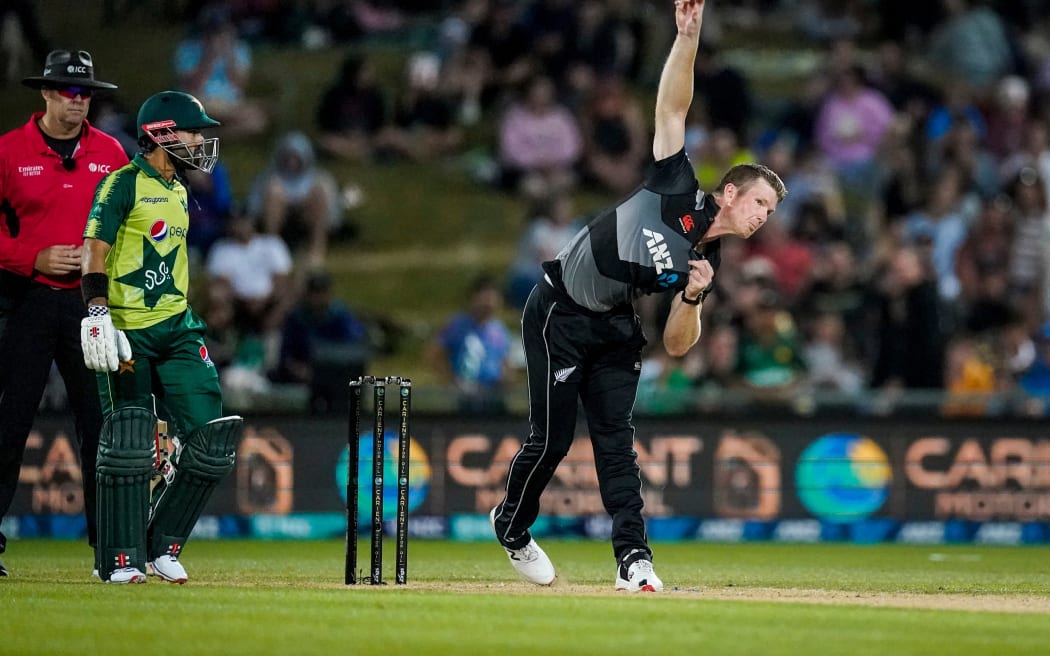 New Zealand's Jimmy Neesham bowling against Pakistan.