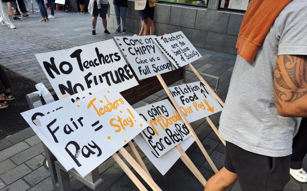 Teachers striking over pay and conditions march in Auckland, 16 March 2023.