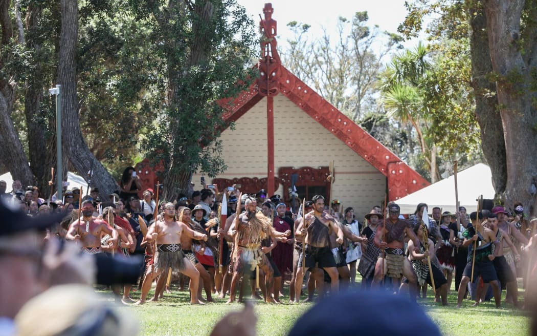 Tangata whenua perform the haka pōwhiri as a delegation including representatives from Kīngitanga, Rātana, Parihaka and Te Pāti Māori are welcomed on to Te Whare Rūnanga at the Treaty grounds, on 4 February, 2024.