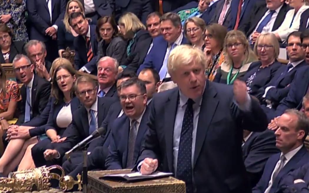 A video grab from footage broadcast by the UK Parliament's Parliamentary Recording Unit Boris Johnson responding to his defeat on Standing Order 24.