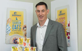 Harraway and Sons chief executive Henry Hawkins with some of its South Island-sourced oats range.