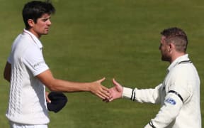 The England captain Alastair Cook (left) shakes hands with his opposite Brendon McCullum, after New Zealand win the second Test by 199 runs.