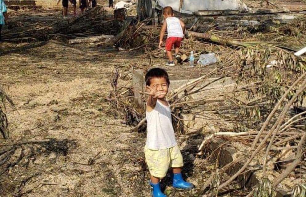 Children in Nuku'alofa in the aftermath of the eruption of Hunga Tonga-Hunga Ha'apai and tsunami.