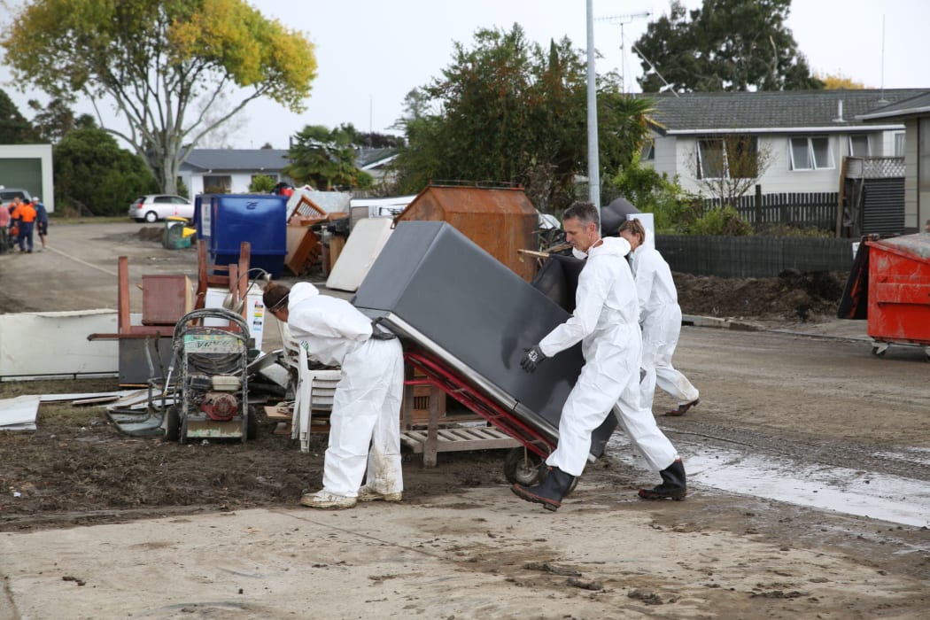 More than 200 people were bussed in each day over the weekend to help clean up.