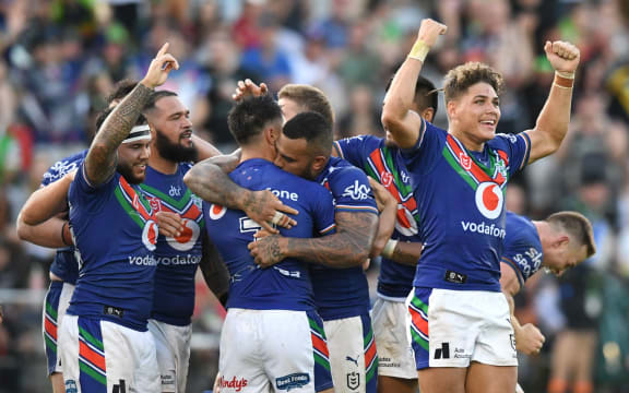The Warriors celebrate their golden point win over the Raiders.