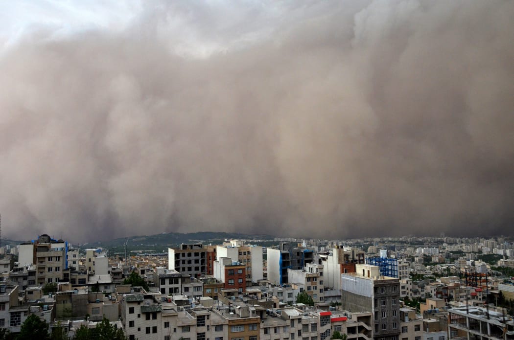 The storm engulfing the northeastern neighbourhood of Minicity, Tehran.