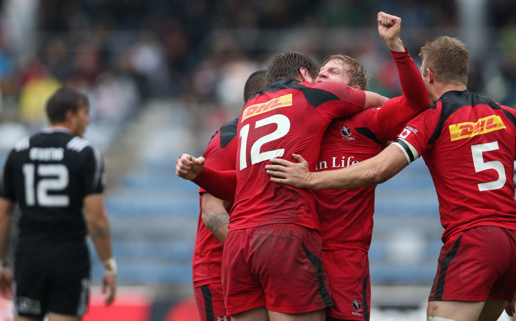 Canada celebrate their 1st victory over the All Black Sevens, Tokyo, 2015.