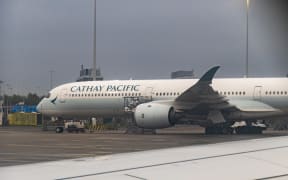Cathay Pacific Airbus A350-1000 passenger aircraft spotted parked at Amsterdam Schiphol Airport. The wide body airplane has the registration tail number B-LXM while is powered by 2x Rolls Royce RR Trent XWB-97 jet engines. Cathay Pacific is the flag carrier airline of Hong Kong with a fleet of 178 aircraft, member of Oneworld aviation alliance group. As of September 2024 according to media, Cathay Pacific grounds A350 fleet after engine failure for an inspection to all 48 widebody planes for a specific Rolls-Royce engine component. EU and EASA the Union's aviation safety agency will order A350 inspection after the engine fire. Amsterdam Schiphol, the Netherlands on April 2024 (Photo by Nicolas Economou/NurPhoto) (Photo by Nicolas Economou / NurPhoto via AFP)