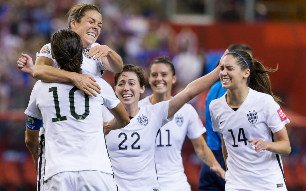 USA Women's Football team celebrate a goal in the 2015 World Cup