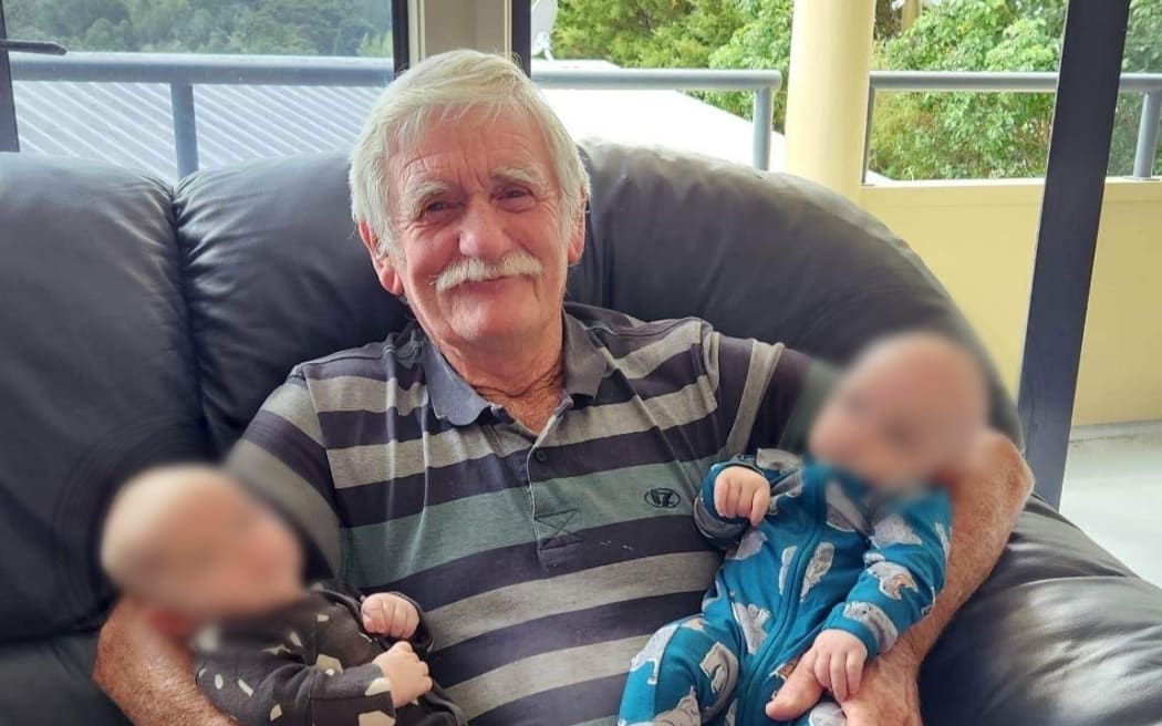 The late Bill Elliott, seen with two of his grandchildren before the crash that sank the family-owned ferry and left him critically injured.