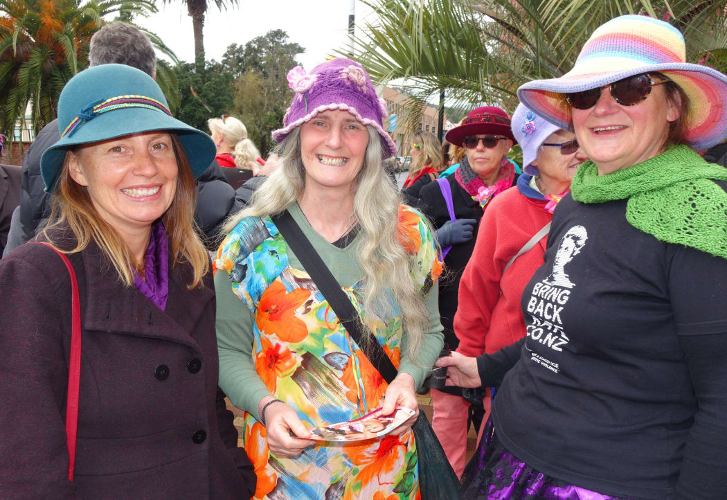 Kate Fulton, Debs Martin and Lulu Purda getting ready to walk in the Suffrage Day march in Nelson today.