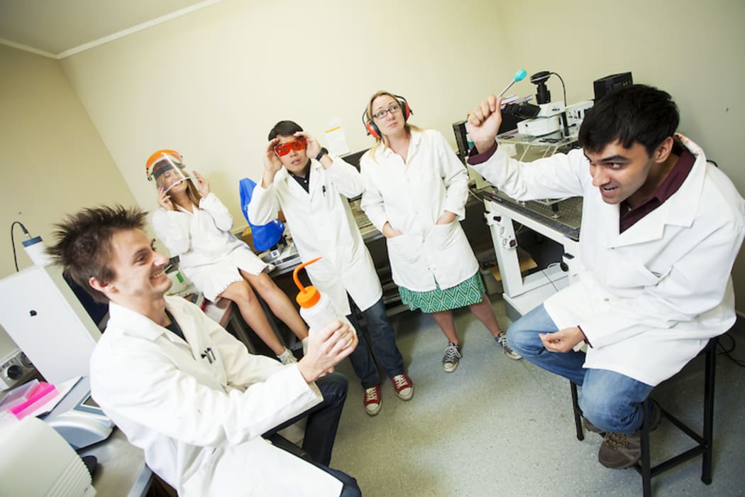 Heather Hendrickson's (centre, with headphones) team at Massey University. Eli Christian and Jess Fitch, who feature in this podcast, are on the left.