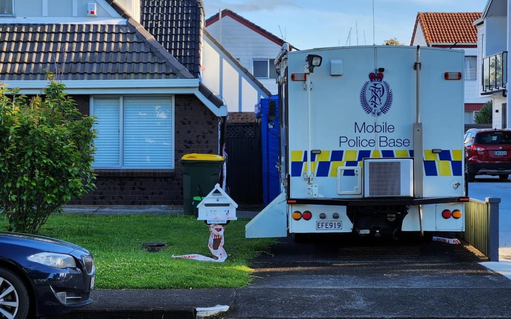 A police van at the Celtic Crescent, Ellerslie, home where a man was found dead on Monday.