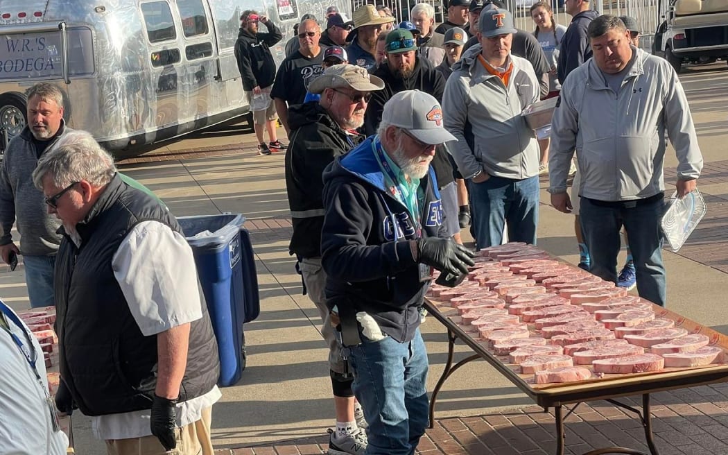Choosing steaks at steak cooking world champs in Texas