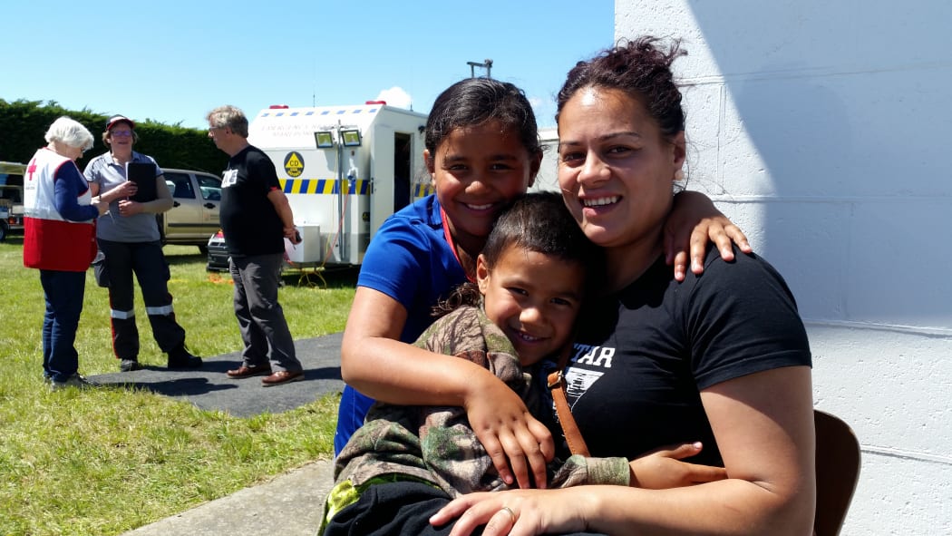 Koko Lambert with her daughter Tiara, 7, and son Elijah, 6, at the Ward emergency welfare centre.