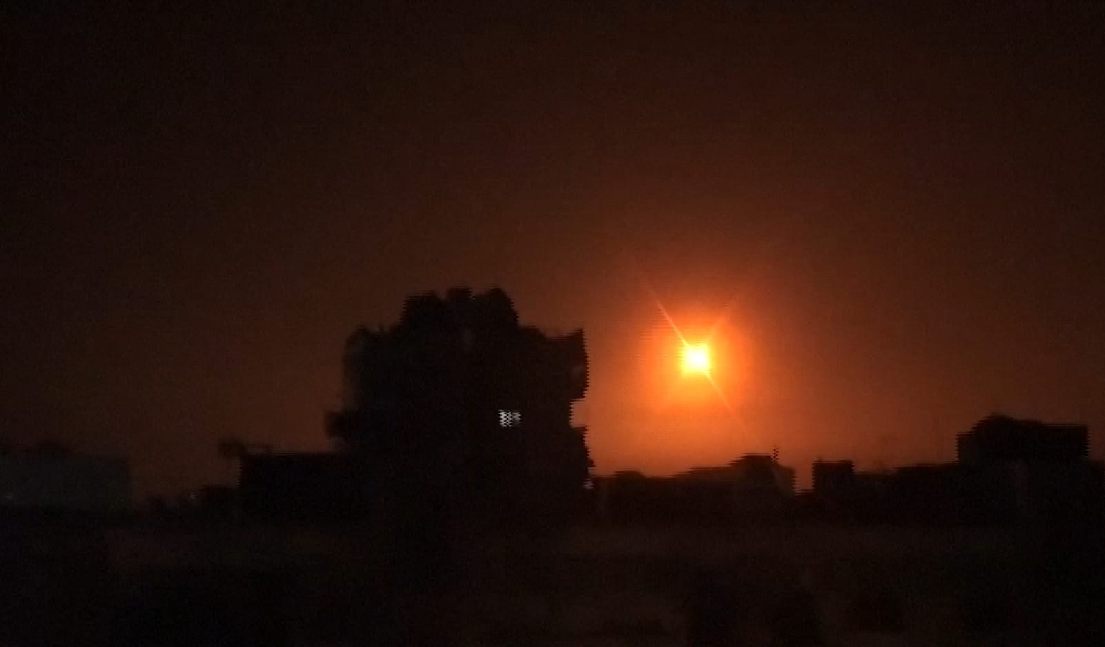 n image grab obtained from handout footage released by the official Syrian Arab News Agency (SANA) on February 14, 2020, reportedly shows footage of Syrian air defence firing into the sky.