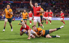 Gareth Davies of Wales scores the team's first try during the Rugby World Cup France 2023 match between Wales and Australia at Parc Olympique on 25 September, 2023 (NZ time) in Lyon, France.