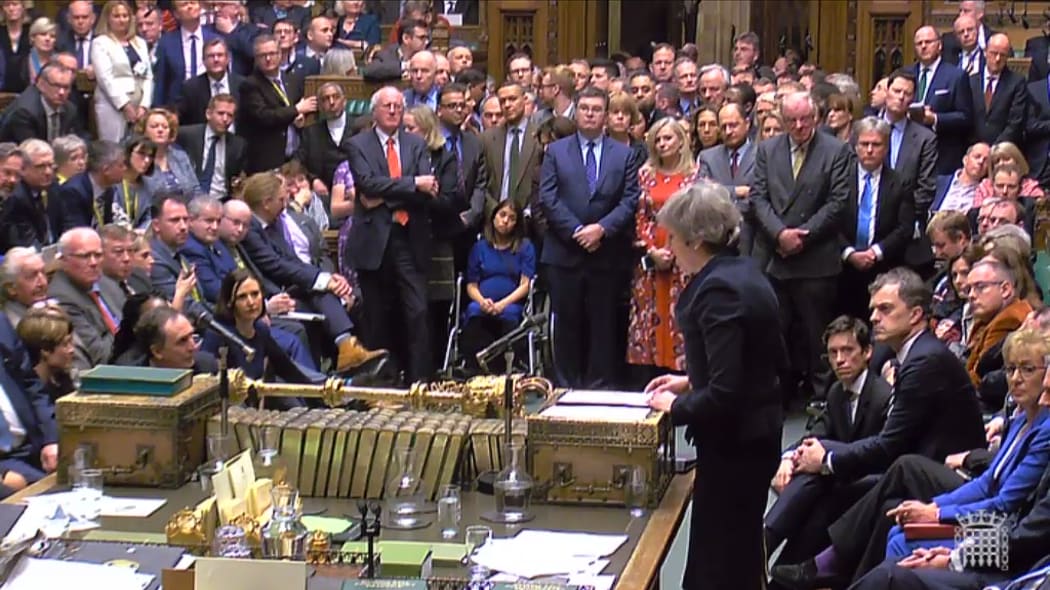 A video grab from footage broadcast by the UK Parliament's Parliamentary Recording Unit (PRU) shows Britain's Prime Minister Theresa May (R) as she speaks in the House of Commons in London on January 15, 2019, after MPs voted to reject the government's Brexit deal.