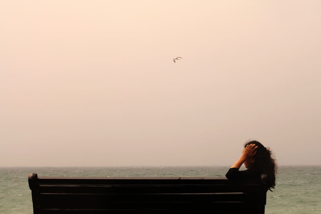woman on park bench