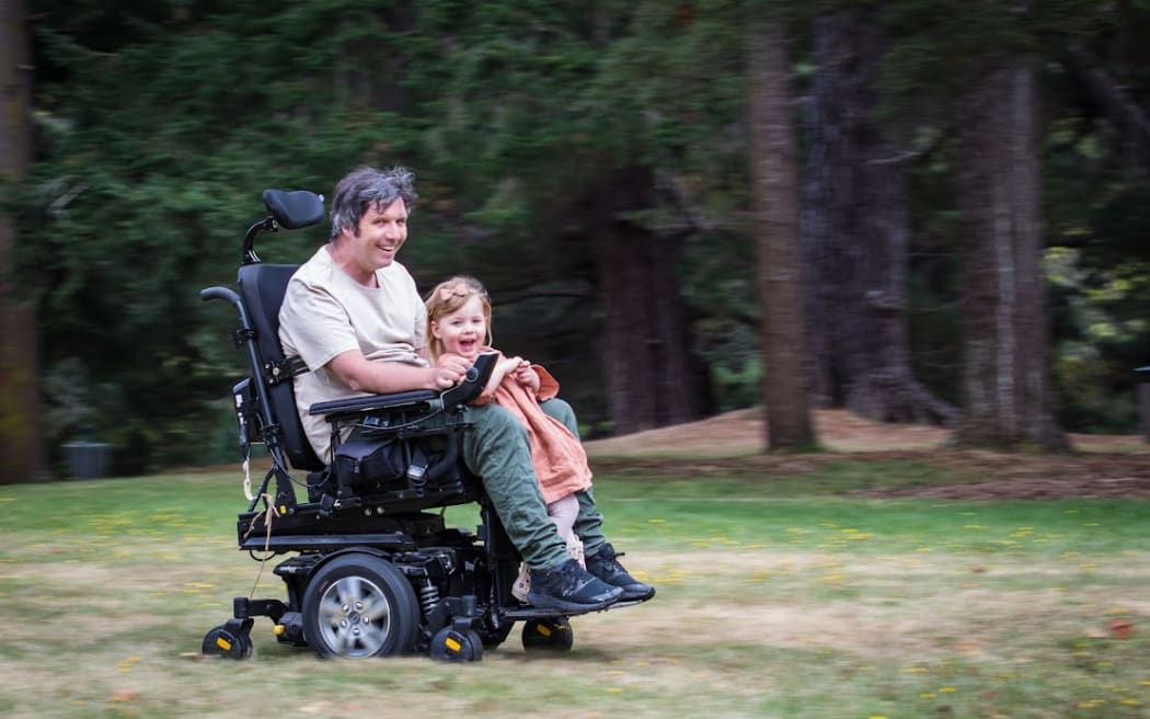 Michael Cockroft with his daughter