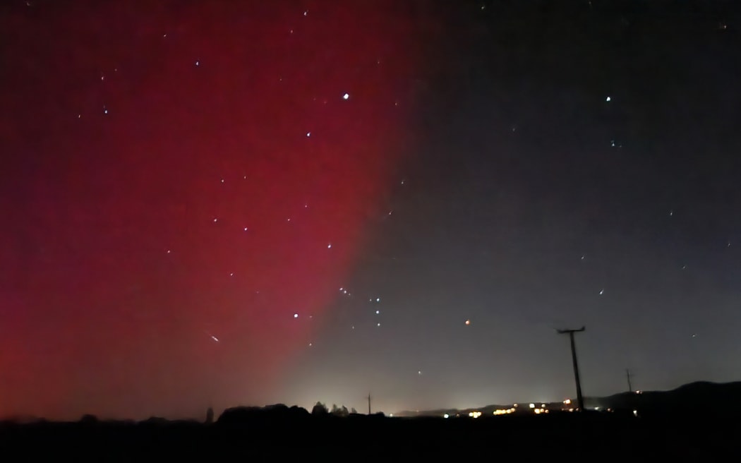 Aurora lights up the sky in Mercer, Auckland on 11 May, 2024.