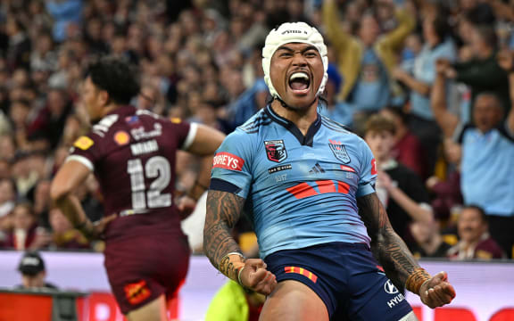 Brian To'o of the Blues celebrates scoring a try during the State of Origin game one, Brisbane, 2025.