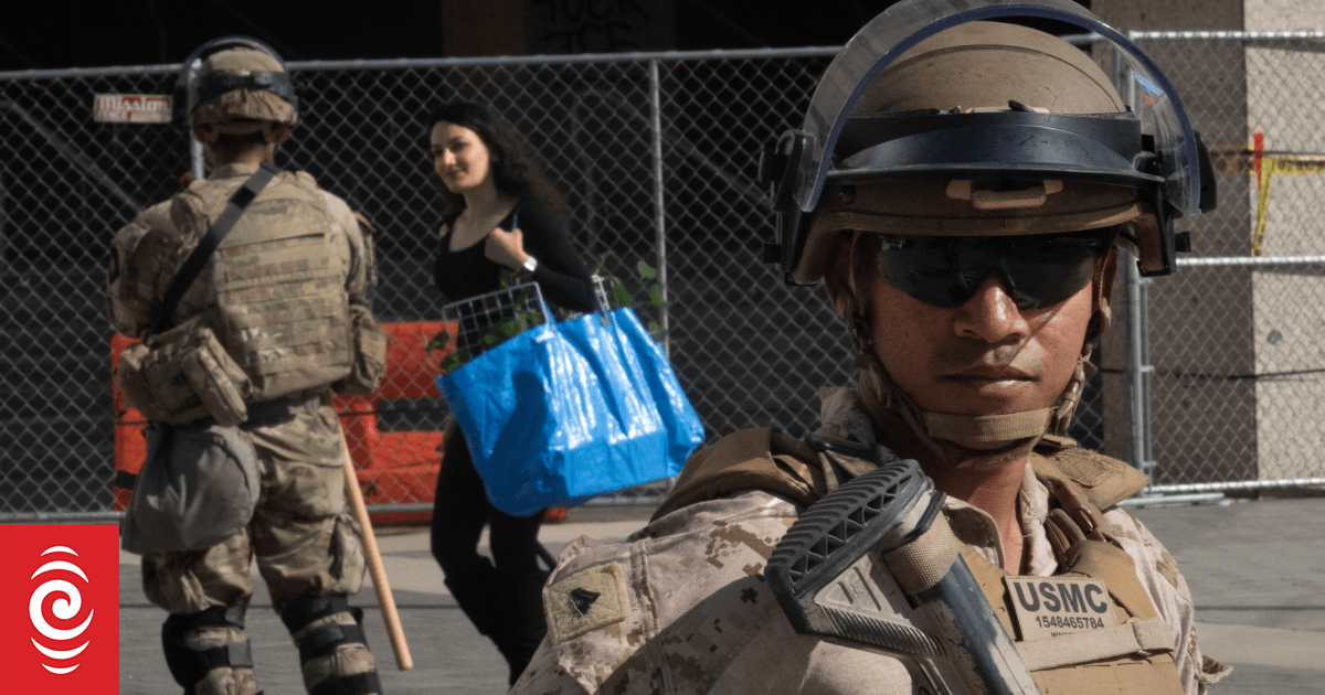 Curfew lifted in LA as Trump battles for control of California troops